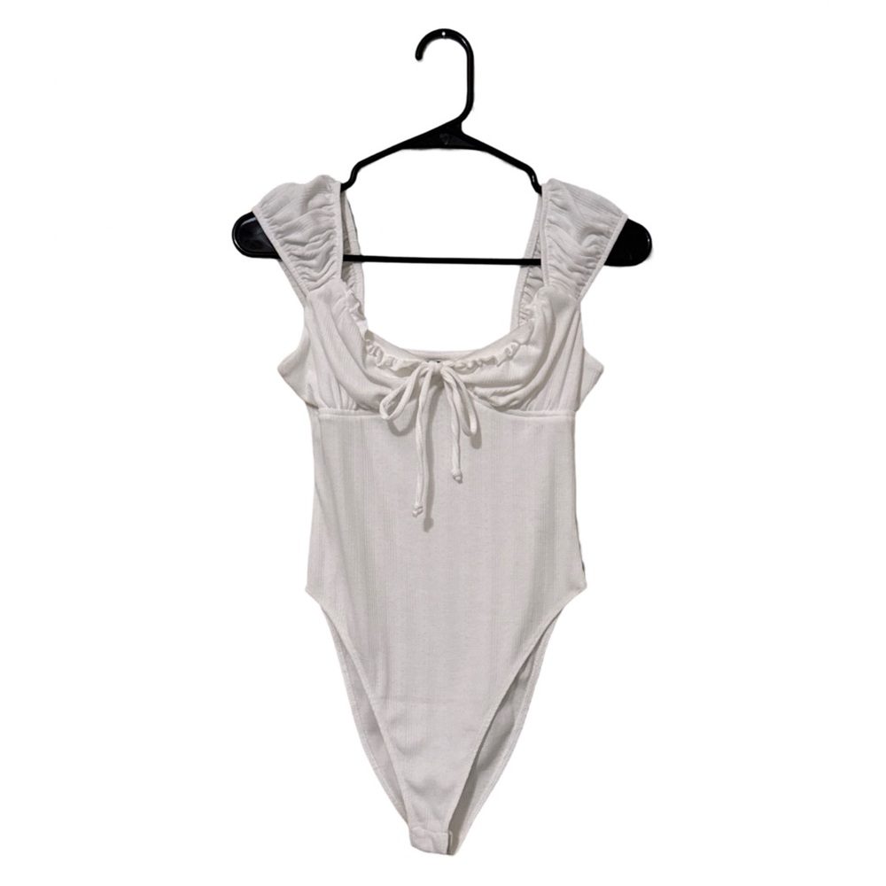 White bodysuit. 
Wild fable. Xs.